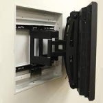 Use a full motion TV bracket to fit into recess